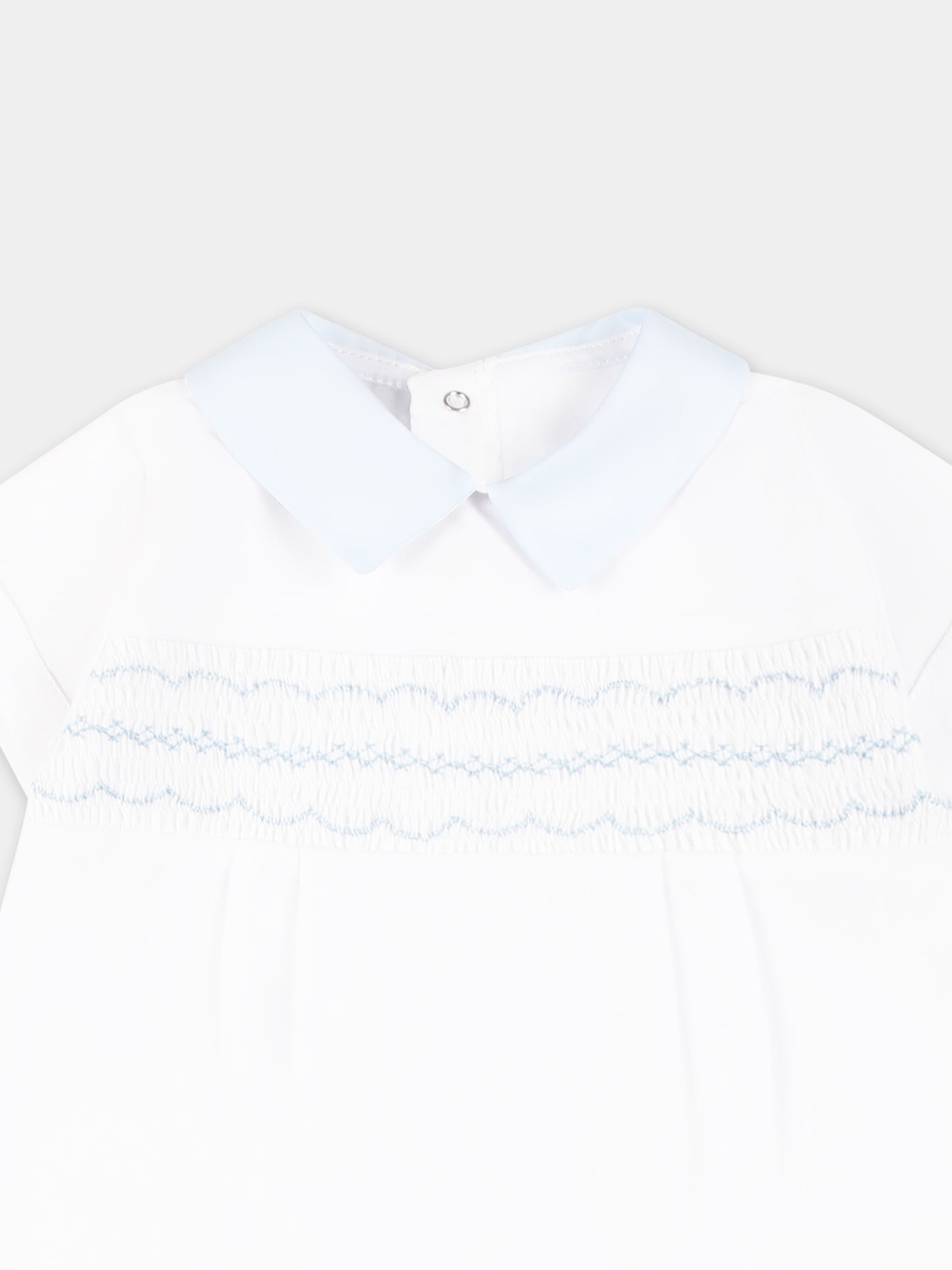 Pagliaccetto bianco per neonato con ricami