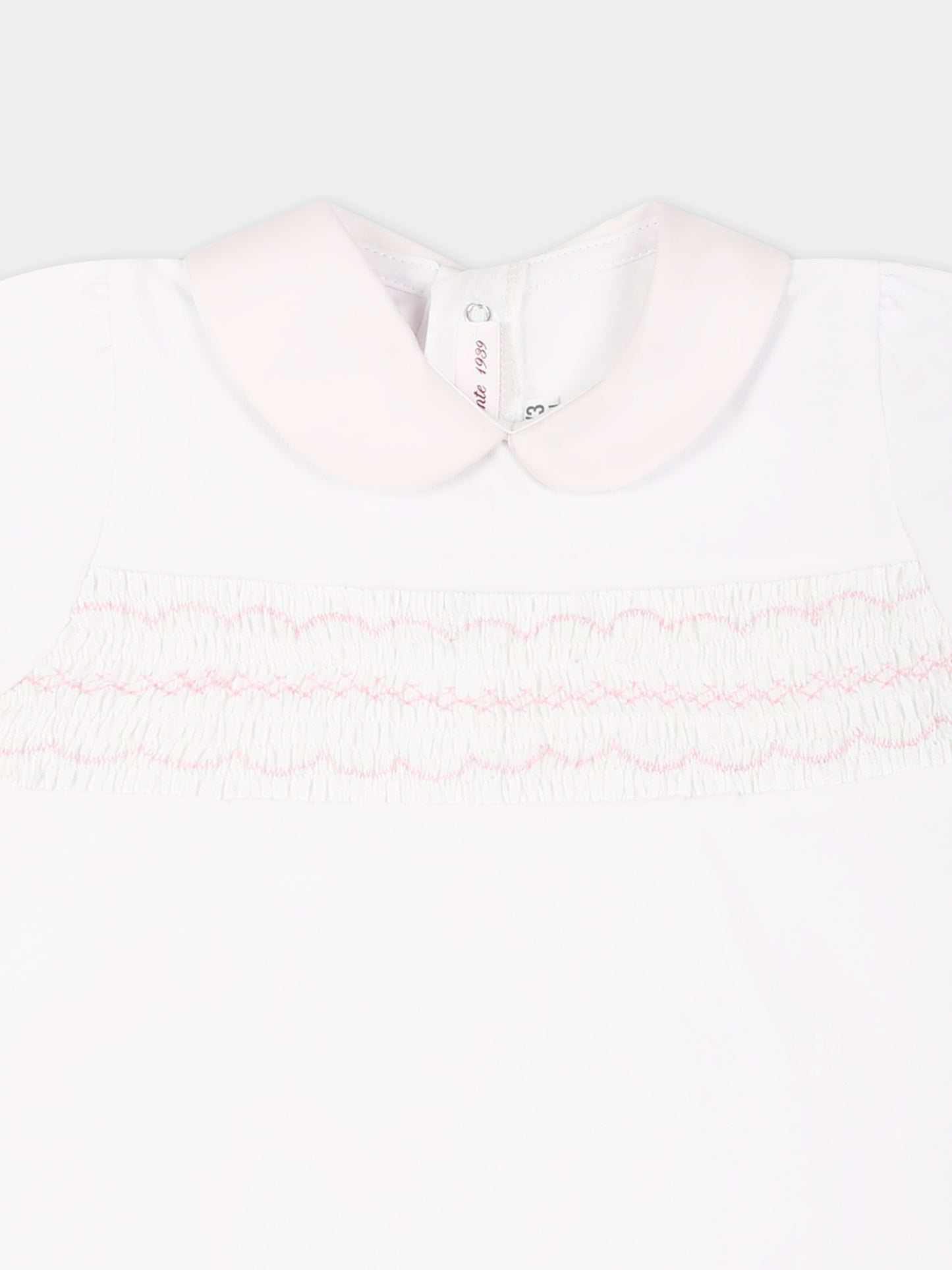 White romper for baby girl with embroidery