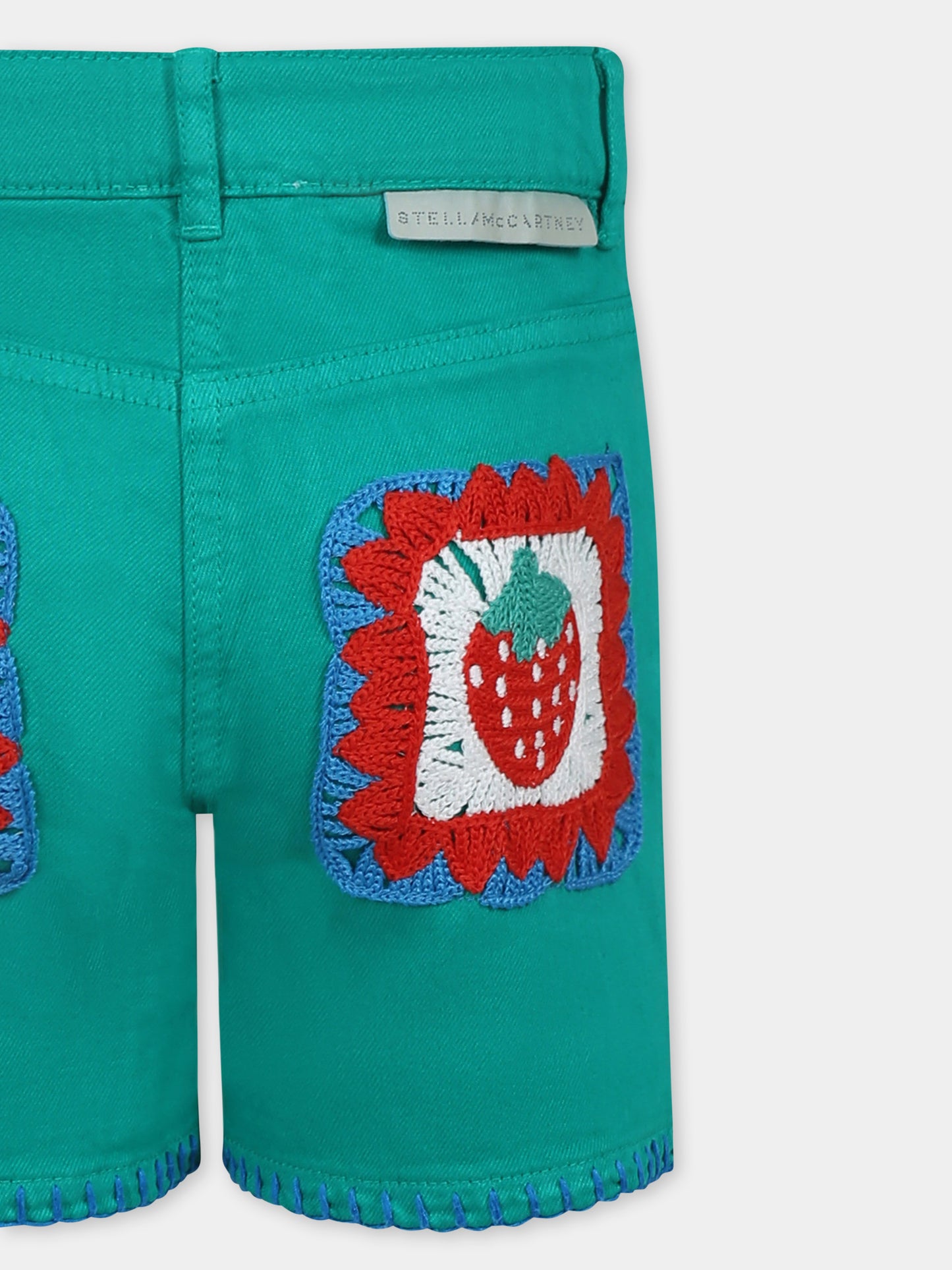 Green shorts for girl with strawberry