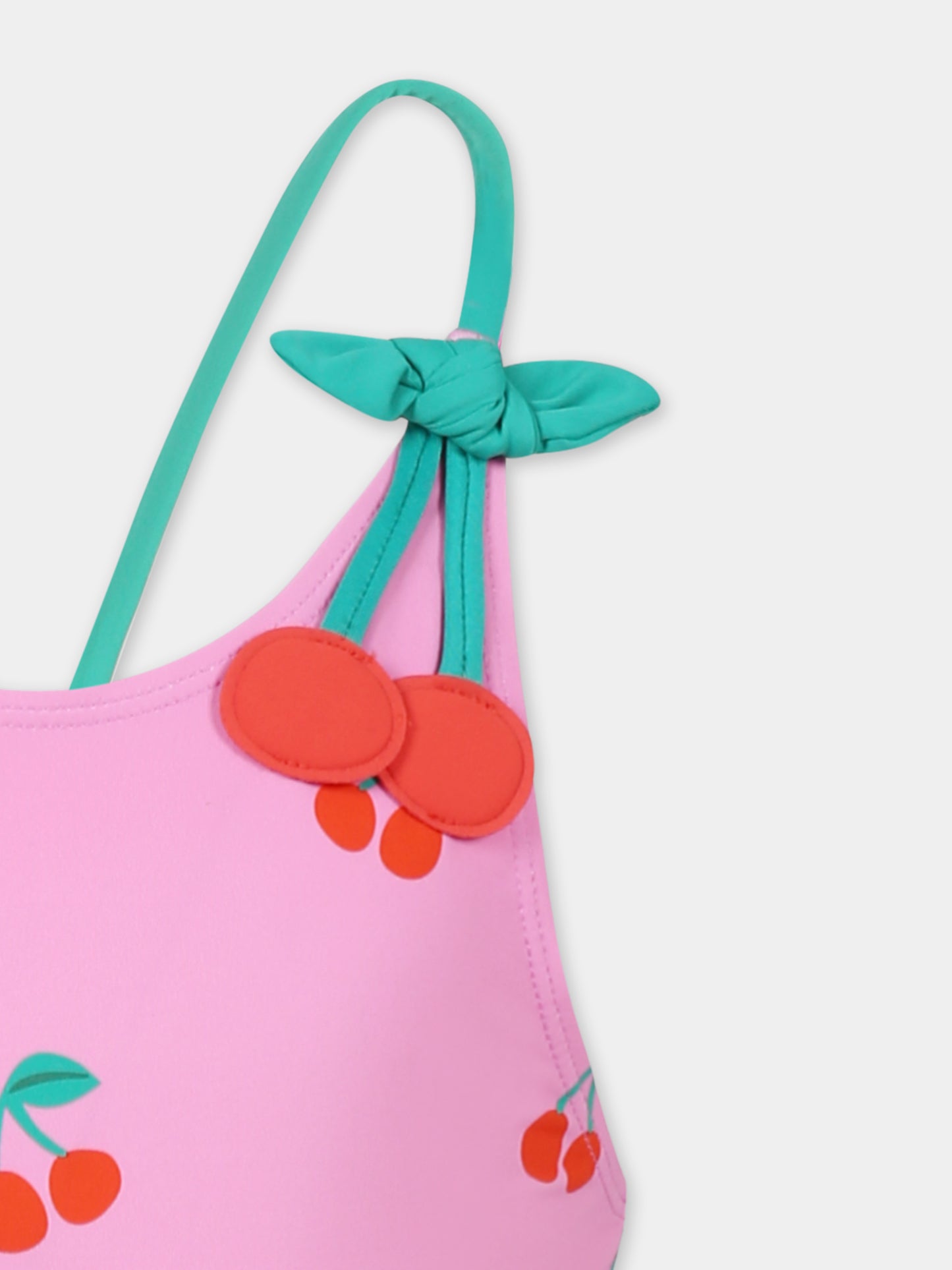 Pink swimsuit for girl with cherries