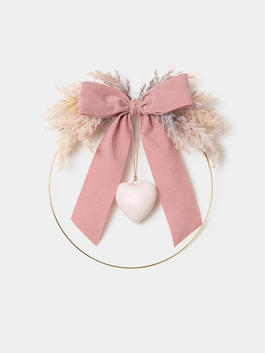 Pink birth bow for baby girl with heart