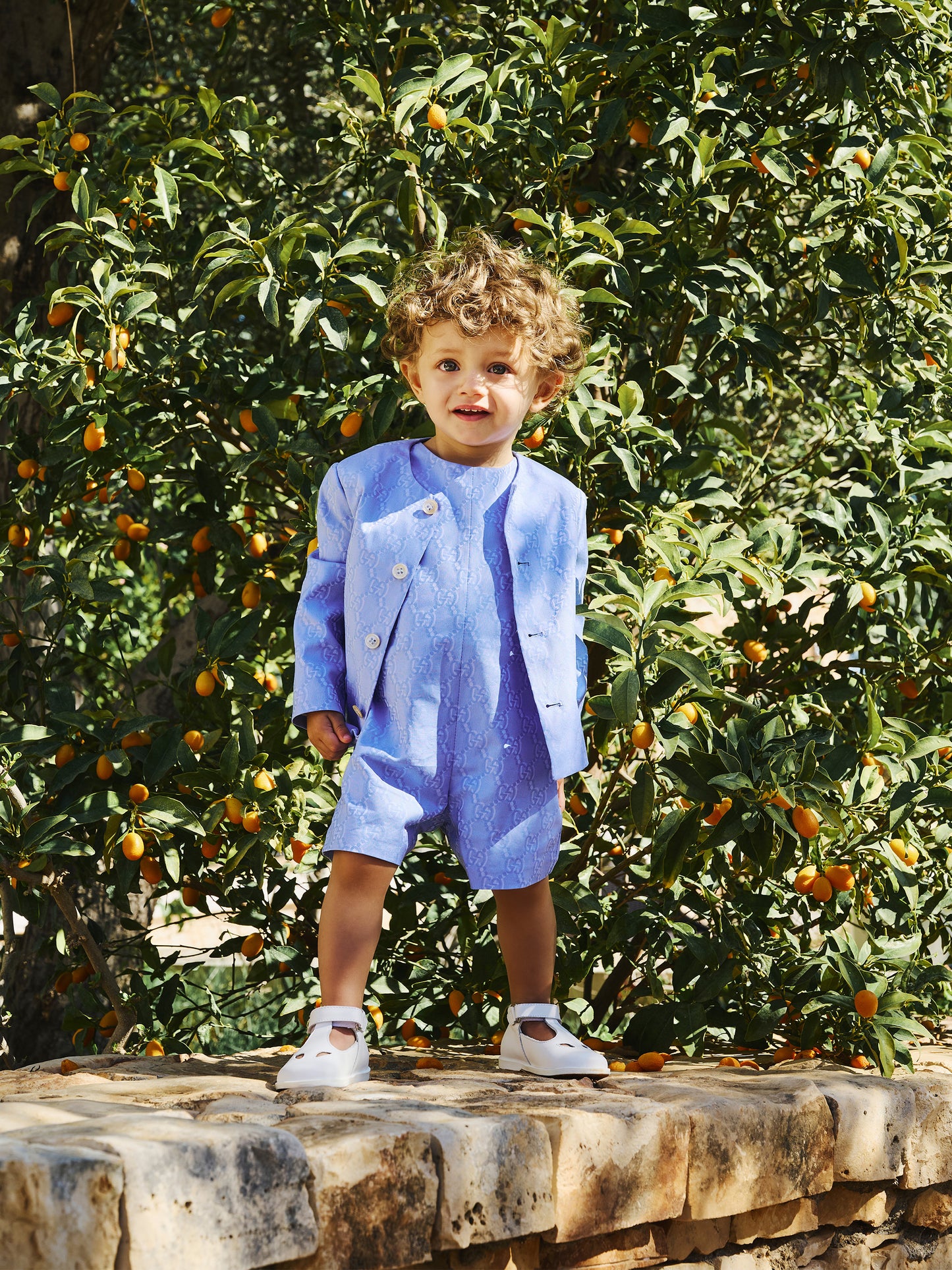 Light blue romper for baby boy with GG