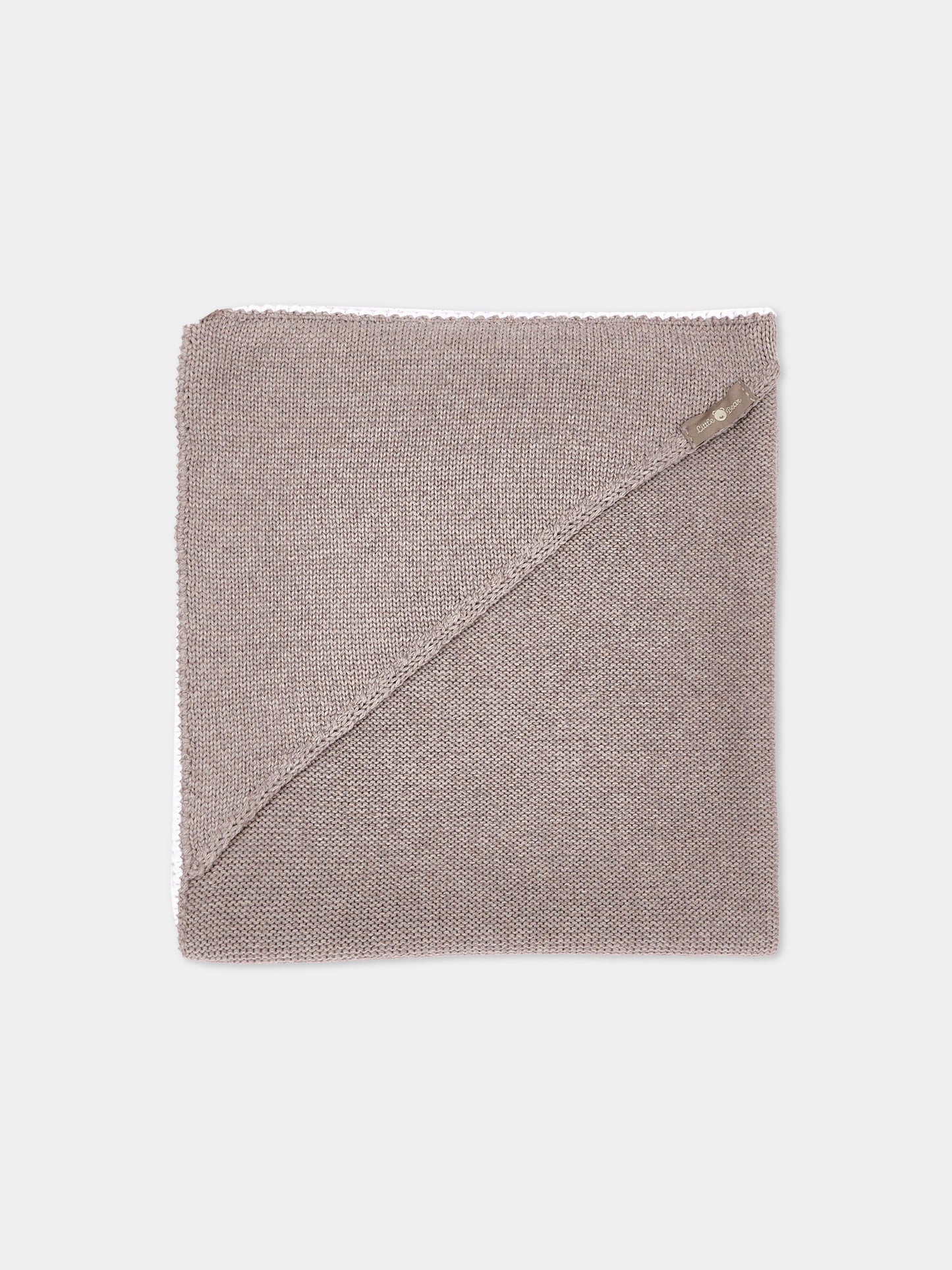 Copertina beige per neonati in maglia