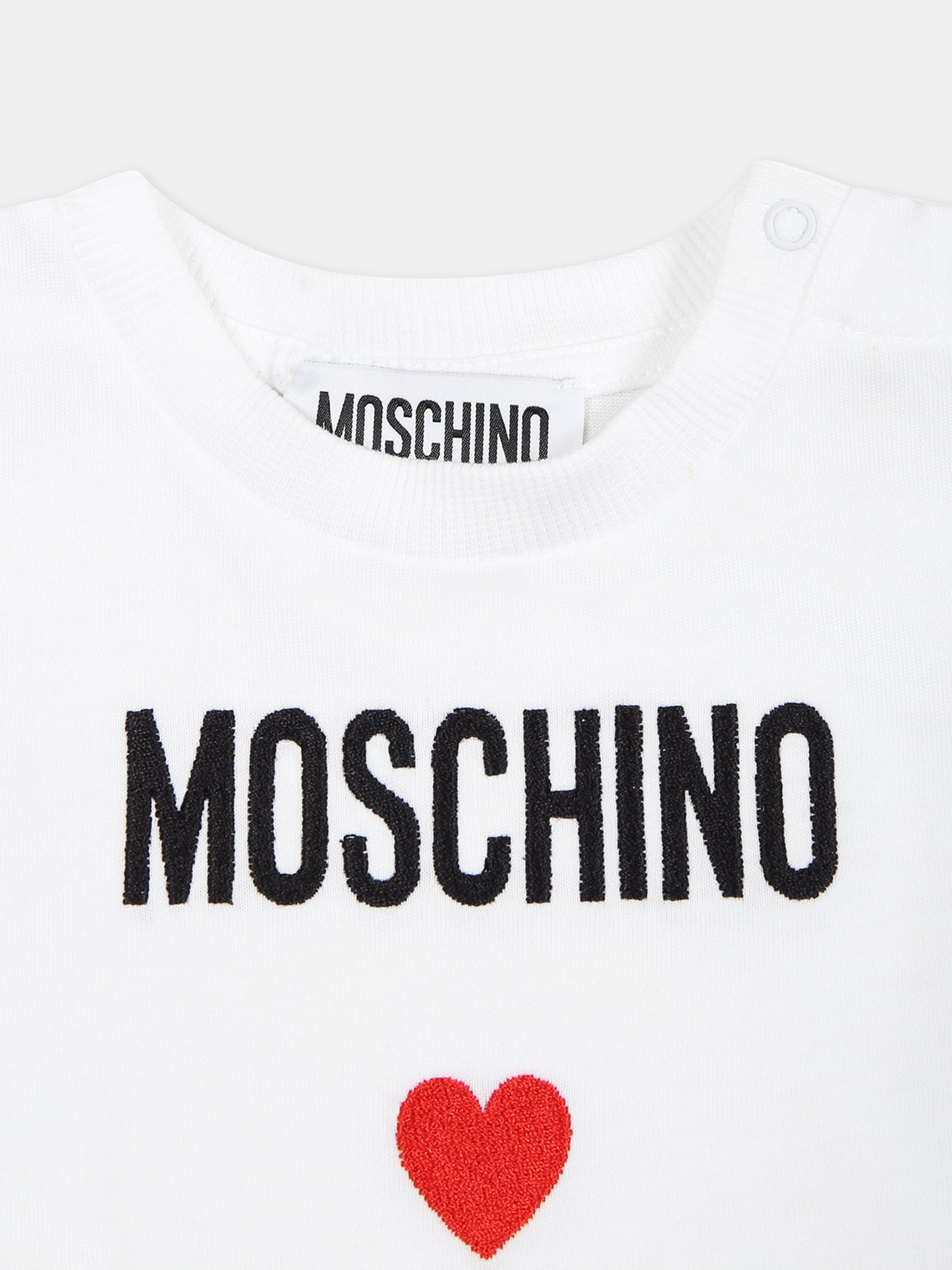 Pagliaccetto bianco per neonata con logo,Moschino Kids,MUY06E LAA22 10101