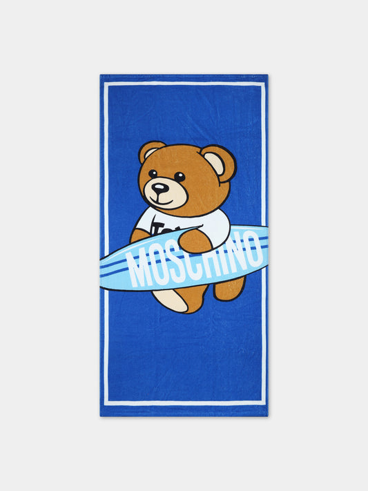 Telo mare azzurro per bambino con Teddy Bear e surf,Moschino Kids,HQX01B LGA15 40289
