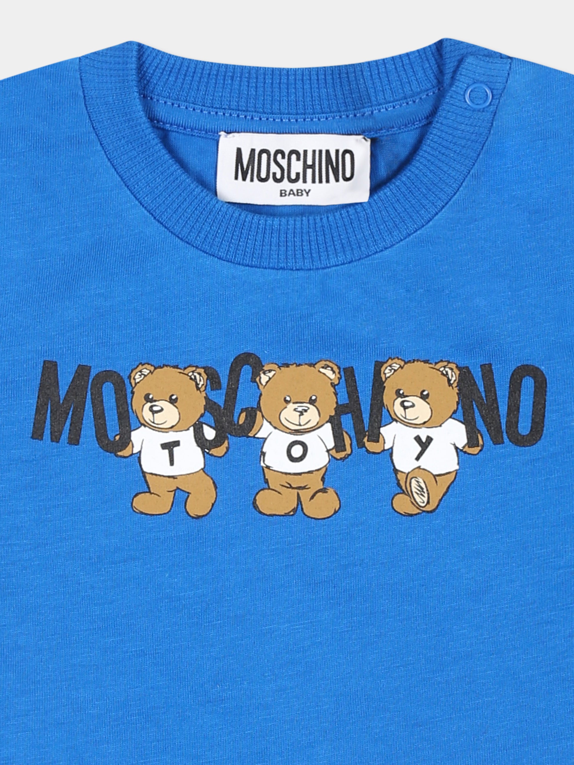 T-shirt azzurra per neonato con tre Teddy Bears,Moschino Kids,M7M032 LAA10 40515