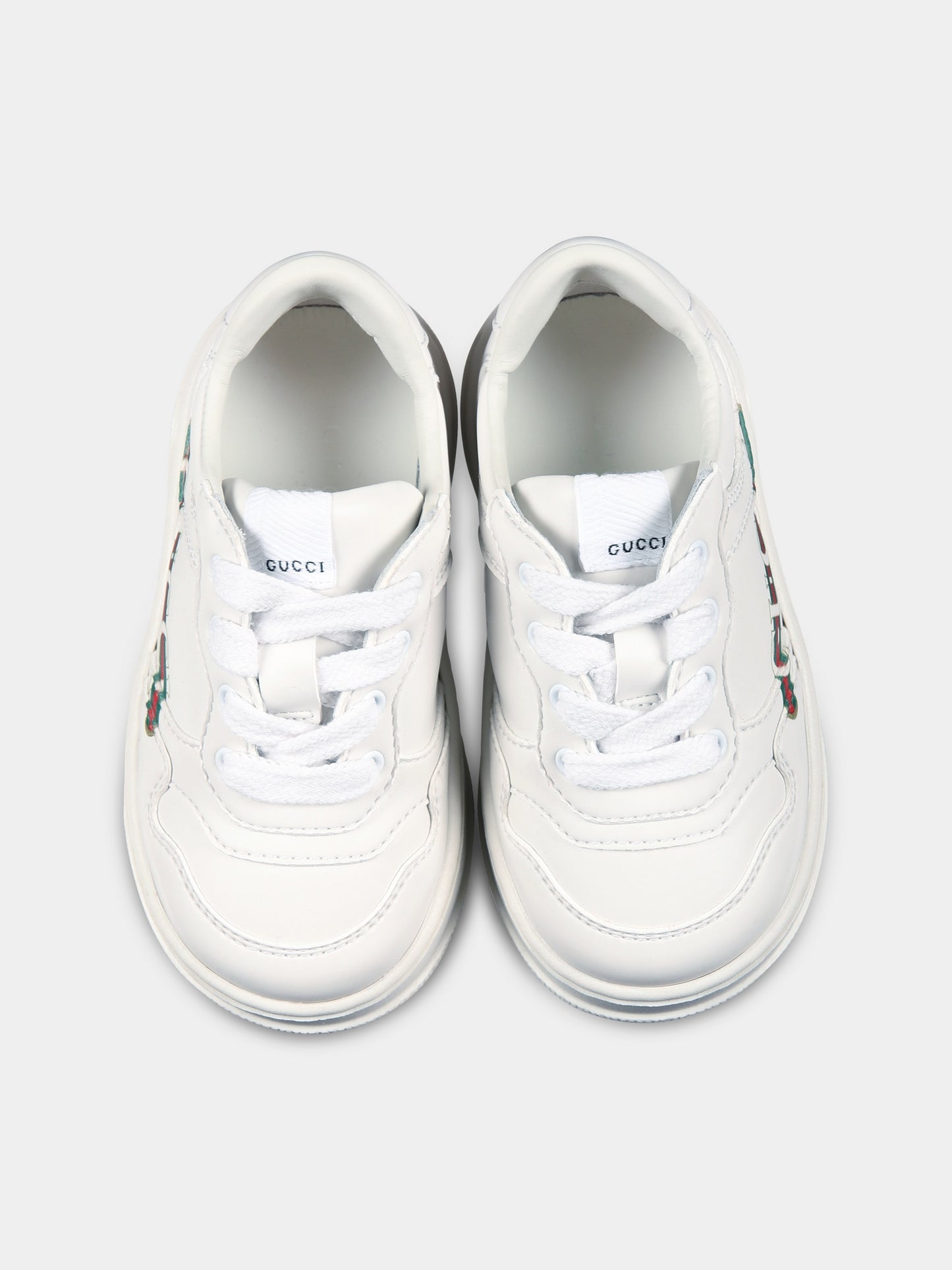 White sneakers for kids with logo