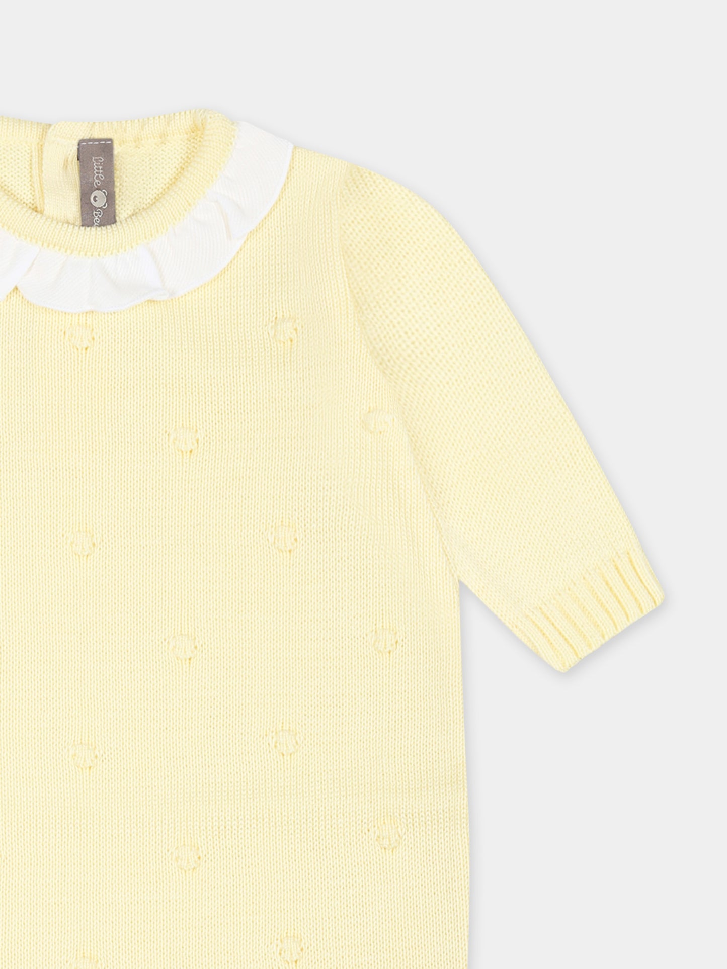 Yellow babygrow for babykids with polka dots
