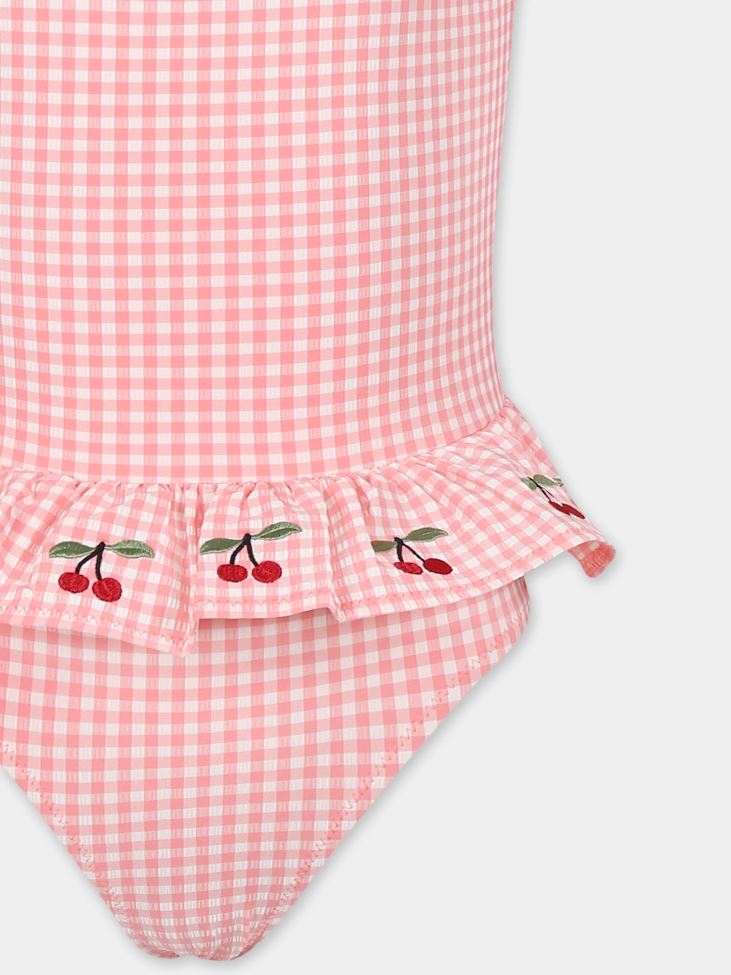 Pink swimsuit for girl with cherries